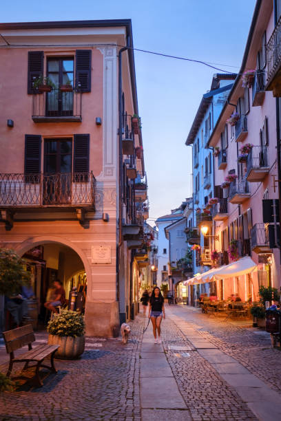 Cuneo Street life, Italian city in Piedmont Italian city at dusk cuneo stock pictures, royalty-free photos & images