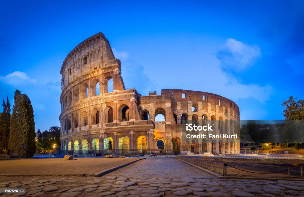 Coliseum in Rome at twilight, Italy Italian city capital Roman architecture Coliseum - Rome Stock Photo
