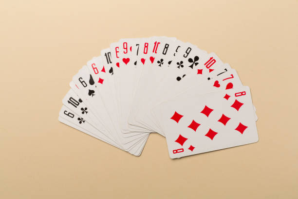 istock Playing cards on color background. Gambling concept. Top view 1407591211