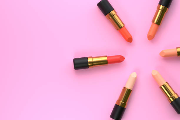 istock Lipsticks close-up on a pastel pink background with copy space 1407591230