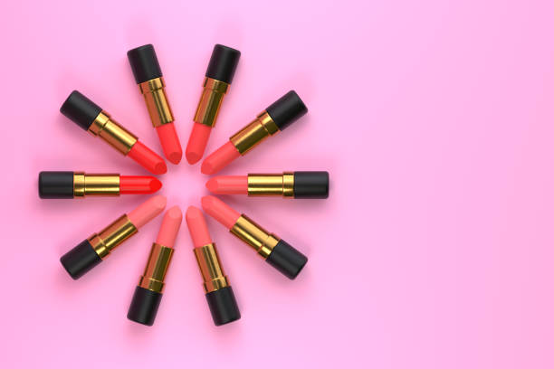 istock Lipsticks close-up on a pastel pink background with copy space 1407591235