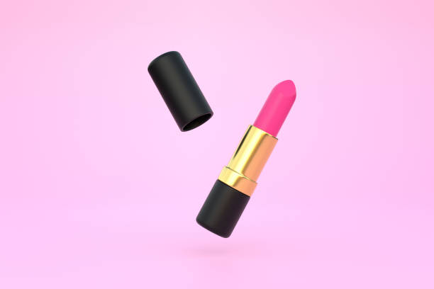istock Lipstick close-up floating on a pastel pink background with copy space 1407591243