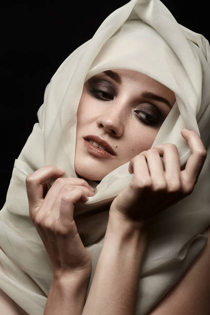 Side view of A Beautiful Muslim woman isolated on white