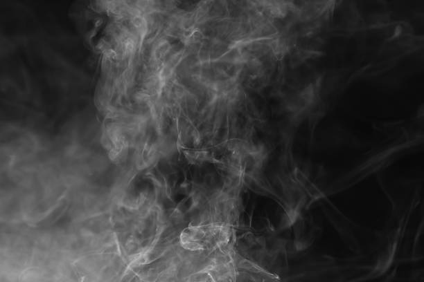 istock Abstract white smoke animated on a black background 1407596311