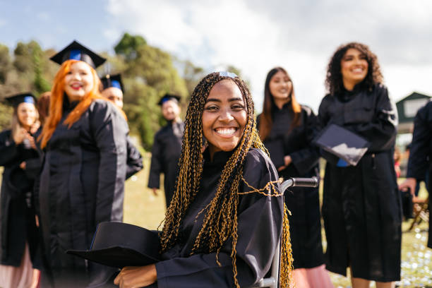 istock Smiling college students at graduation 1407609244