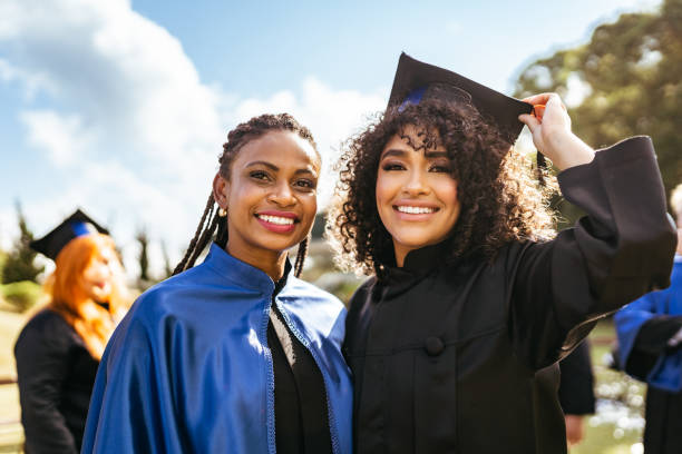 istock Teacher anda young woman who graduated 1407609255