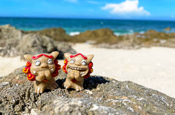 istock Shisa figurine and background material Okinawa 1407609412