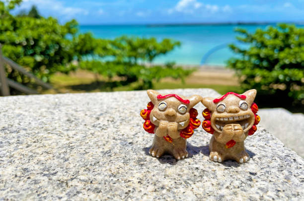 istock Shisa figurine and background material Okinawa 1407609425