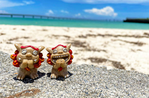 istock Shisa figurine and background material Okinawa 1407609427