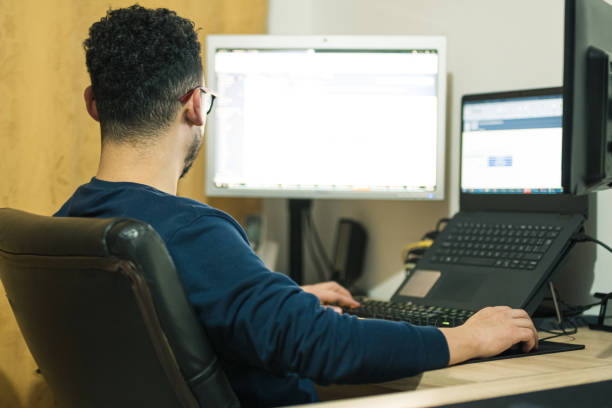 istock Online jobs to generate extra income. freelance worker using his computer to make transactions and purchases online for his business. 1407617925