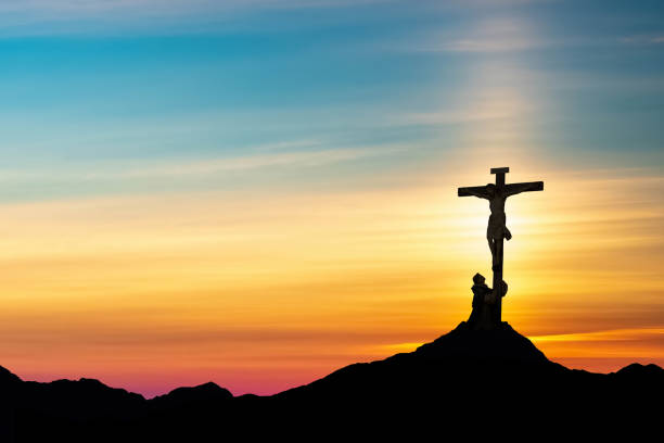 istock Jesus Christ statue against beautiful sky background 1407617984