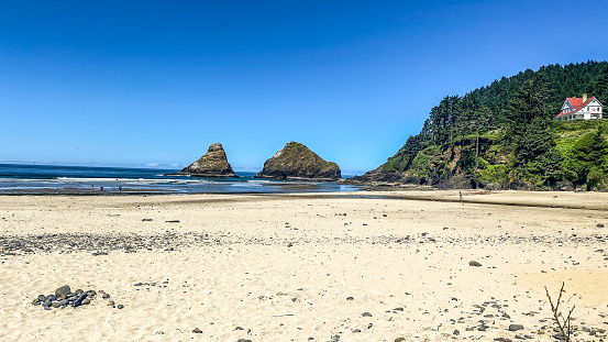 Haceta Head Lighthouse State Park, located in Oregon, is a beautiful destination. Its sandy beach and rocky cove creates a beautiful example of what Oregon beaches has to offer. Many visit this state park daily. Its large rock formations create stunning views of the Pacific Ocean. It I