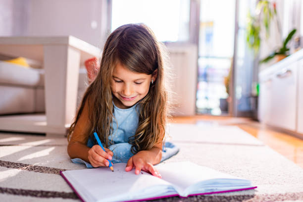 istock Beautiful girl drawing 1407625378