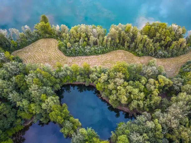Aerial View on the quarry lake Rohrhofer See at Bruehl in Germany.