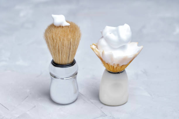 istock Used and new shaving brushed with rich lather 1407634155