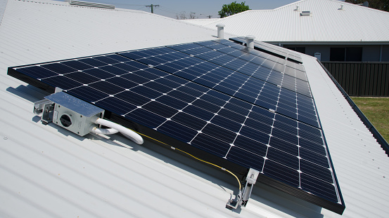 Solar panels that have been cleaned with Reverse Osmosis water. Mounted to roof sheets with aluminum brackets.