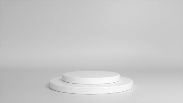 istock White glossy podium, pedestal on white background. Blank showcase mockup with empty round stage. Abstract geometry shape background. Stage for advertising product display with copy space. 3d render 1407644672