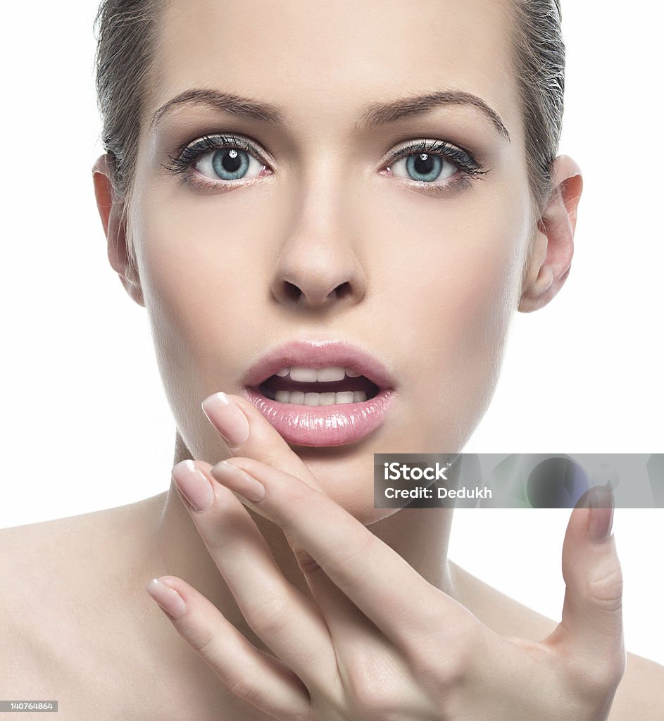 woman beauty head and shoulders close-up portrait of attractive caucasian young woman looking at camera isolated on white studio shot Fingernail Stock Photo