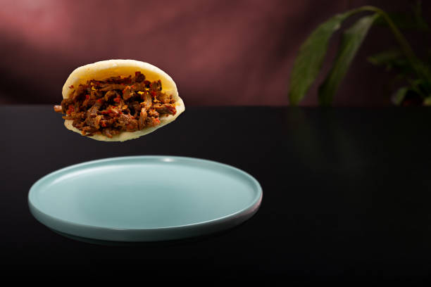 istock Arepa stuffed with shredded meat filling 1407648702