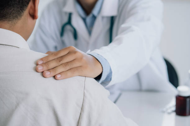 istock Man Visits Doctor's Office Suffering With Depression. PTSD Mental health concept. 1407648908