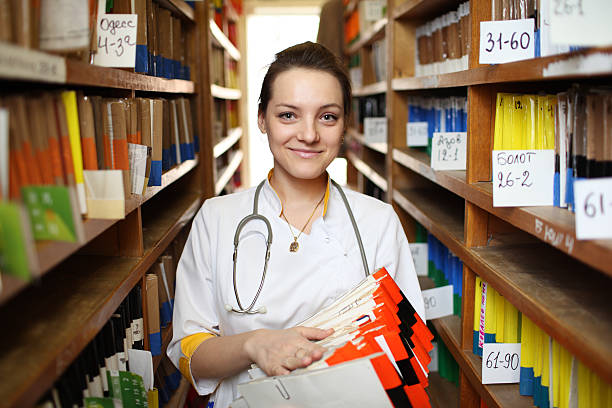istock Doctor with medical records 140764895