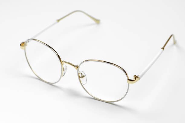 istock Stylish eyeglasses on a white background. Iron frame glasses 1407649477