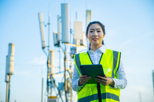 istock Engineer portait standing near a telecommunications tower 1407650511