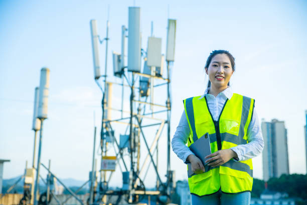 istock Engineer portait standing near a telecommunications tower 1407650563