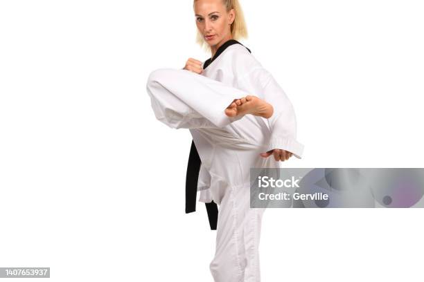 Protected Stock Photo - Download Image Now - Kicking, Taekwondo, 35-39 Years