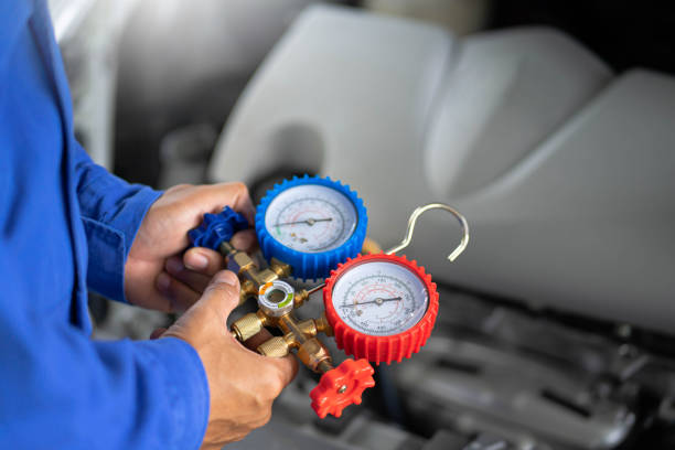 istock Check car air conditioning system refrigerant recharge. 1407654696