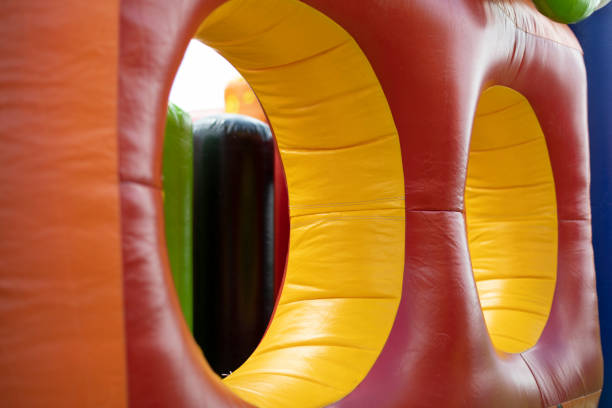 istock Inflatable design. Children's area. Trampoline in play park. 1407655085