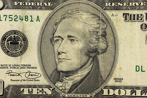 President Hamilton face on the ten dollar bill closeup
