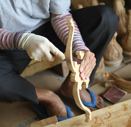 The process of making handmade wooden furniture.