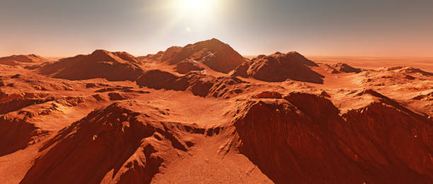 istock Mars planet landscape, 3d render of imaginary mars planet terrain, orange eroded desert with mountains and glaring sun 1407663231