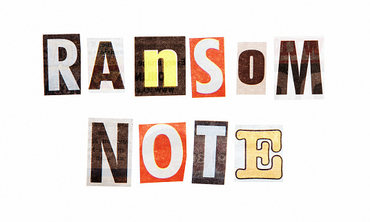 Ransom note made of cut-out letters.