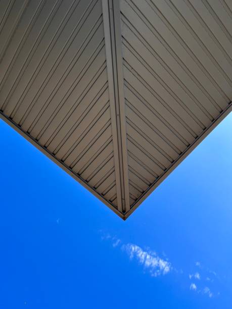 istock architecture of a building looks at the blue sky 1407667467