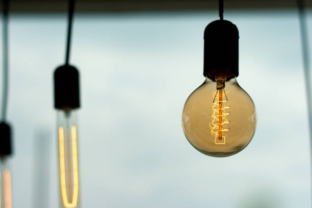 istock Close up image of a retro style light bulb. 1407671948