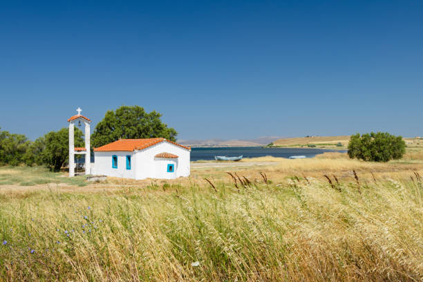 Small chapel of Agios Nikolaos (Saint Nicholas) outside the village of Moudros on Lemnos island in Greece. stock photo