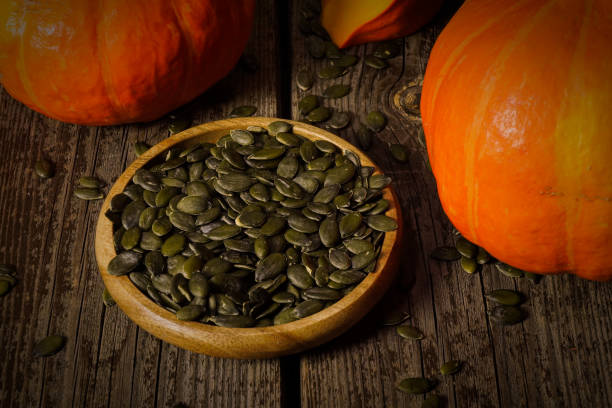 istock Healthy ripe pumpkin and pumpkin seeds 1407674056