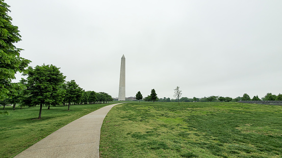 Just a walk through this curved pathway and you are at the base of the Washington Monument, which is located in Washington DC.