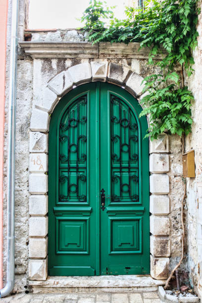 istock Old green doors in medieval city 1407677531