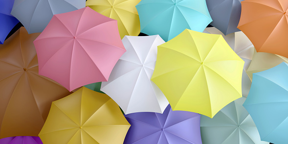 Pastel color umbrellas background, colorful decoration top view. Rain protection for crowd, safety concept. 3d render