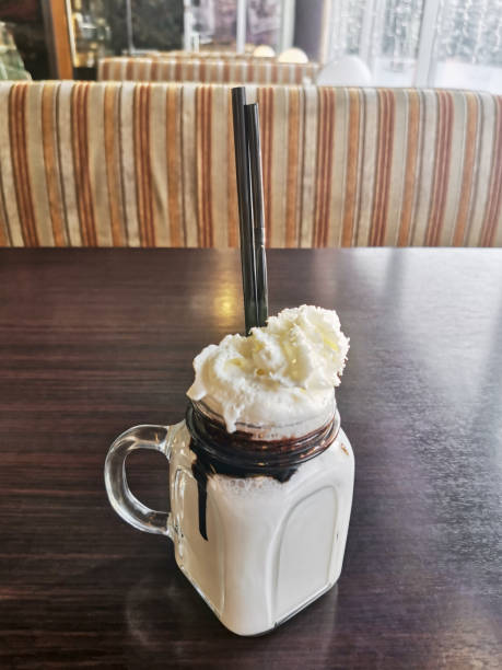 istock milkshake mug on a brown table in a cafe 1407678065