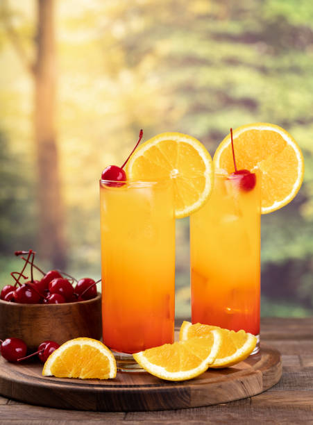 istock Tequila sunrise cocktail with rural background 1407678091