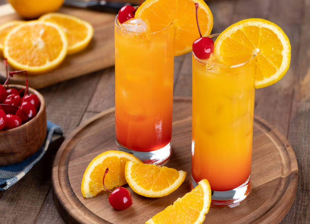 istock Tequila sunrise cocktail with orange slice and cherry 1407678101