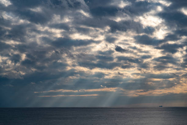 Sunlight beams illuminating the sea off the Greek island of Kos.