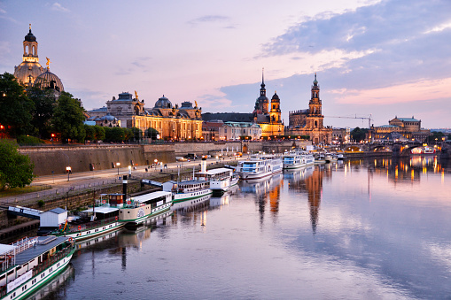 Dresden skyline with Frauenkirche and Elbe river at sunset, Germany