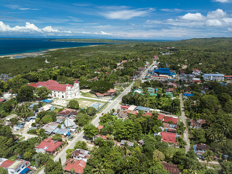 Aerial of the town of Loon, Bohol, Philippines. The Lady of Light Church is the most prominent landmark in the municipality.