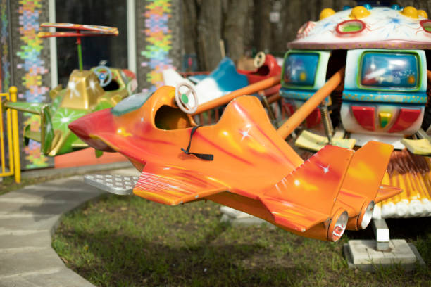 Children's attractions in park. Play plane for kids. Fun place to relax.