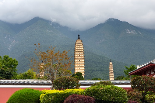 Three pagodas of Chongsheng Temple,Dali City,Yunnan Province,\nThe big pagoda, 69.13 meters high and 9.9 meters square at the base, was built during the Nanzhao State of the Tang Dynasty (833-840), while the two smaller pagodas were built during the Dali State (1108-1172), with a height of 42.17 meters.  Chongsheng Temple three towers of architectural art to the peak, with high historical and cultural value;  It was one of the first national key cultural relics protection units.  Now, it is a national 5A scenic spot.